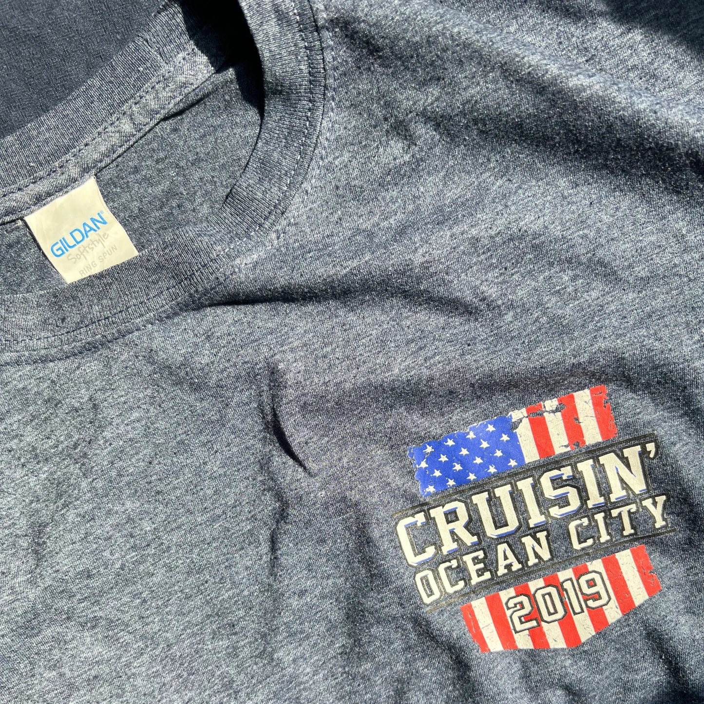 T-shirt with 'Cruisin' Ocean City 2019' design featuring American flags.