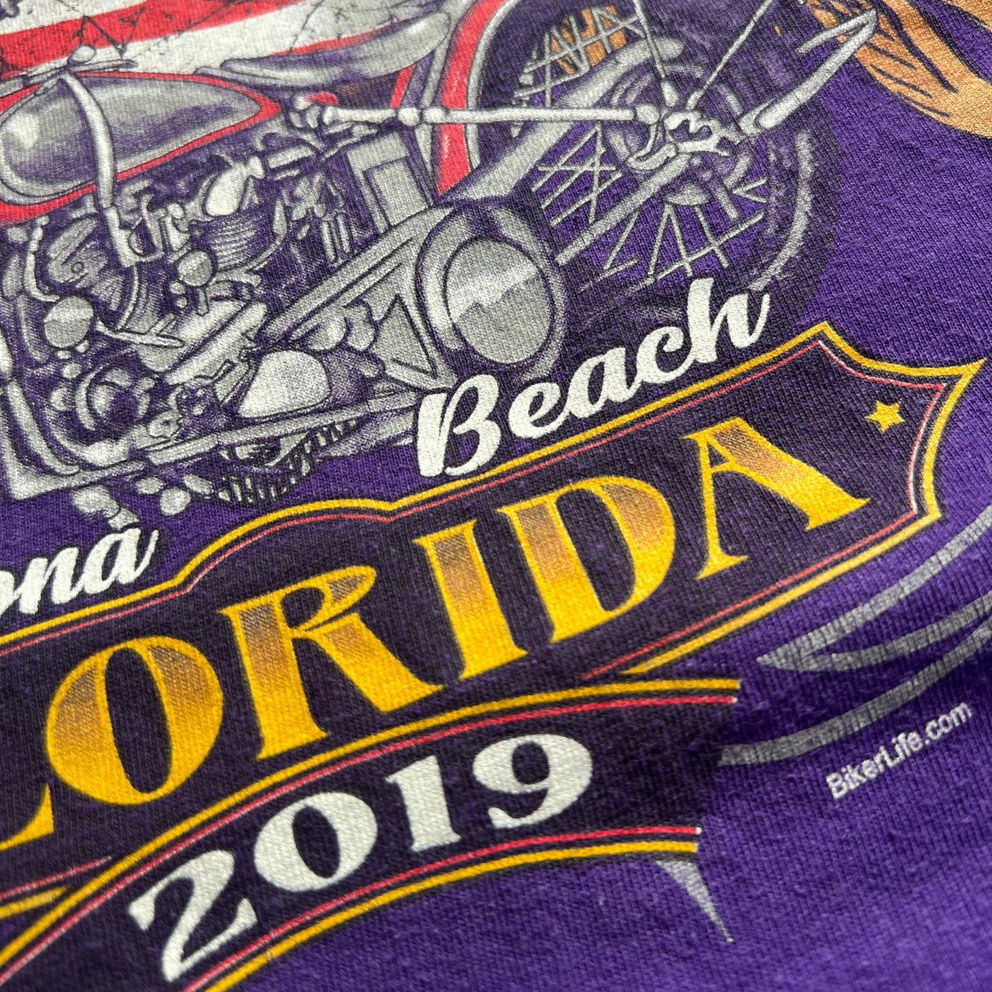 Close-up of a purple T-shirt with daytona beach Florida print