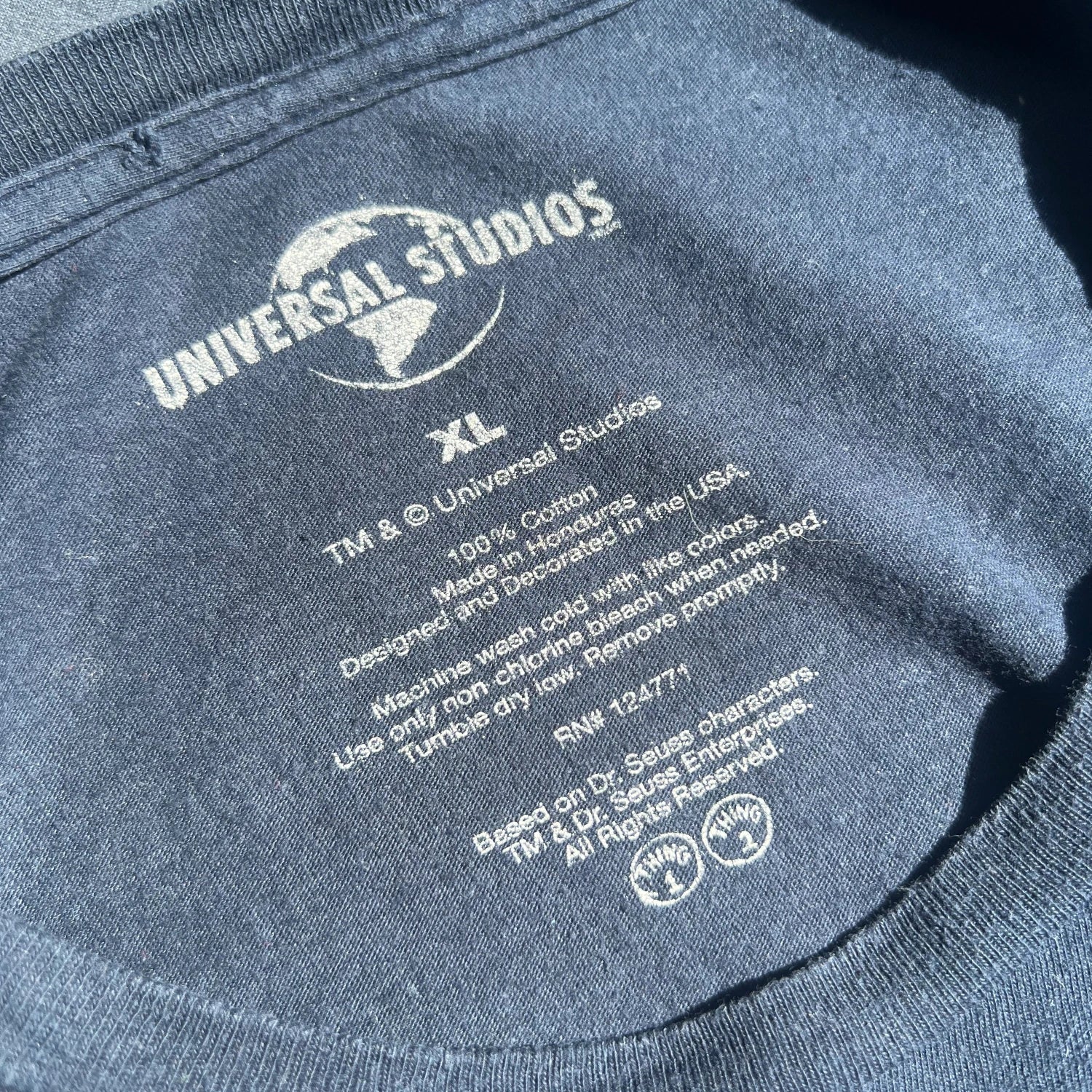 Navy Blue T-shirt with Universal Studios logo and garment information