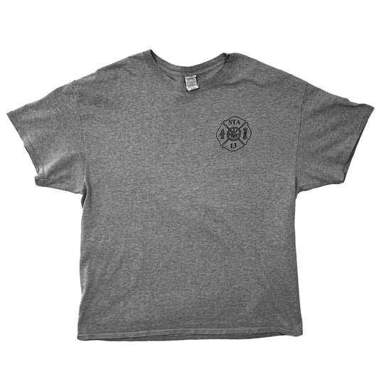 A black line art logo on a light heather grey color T-shirt