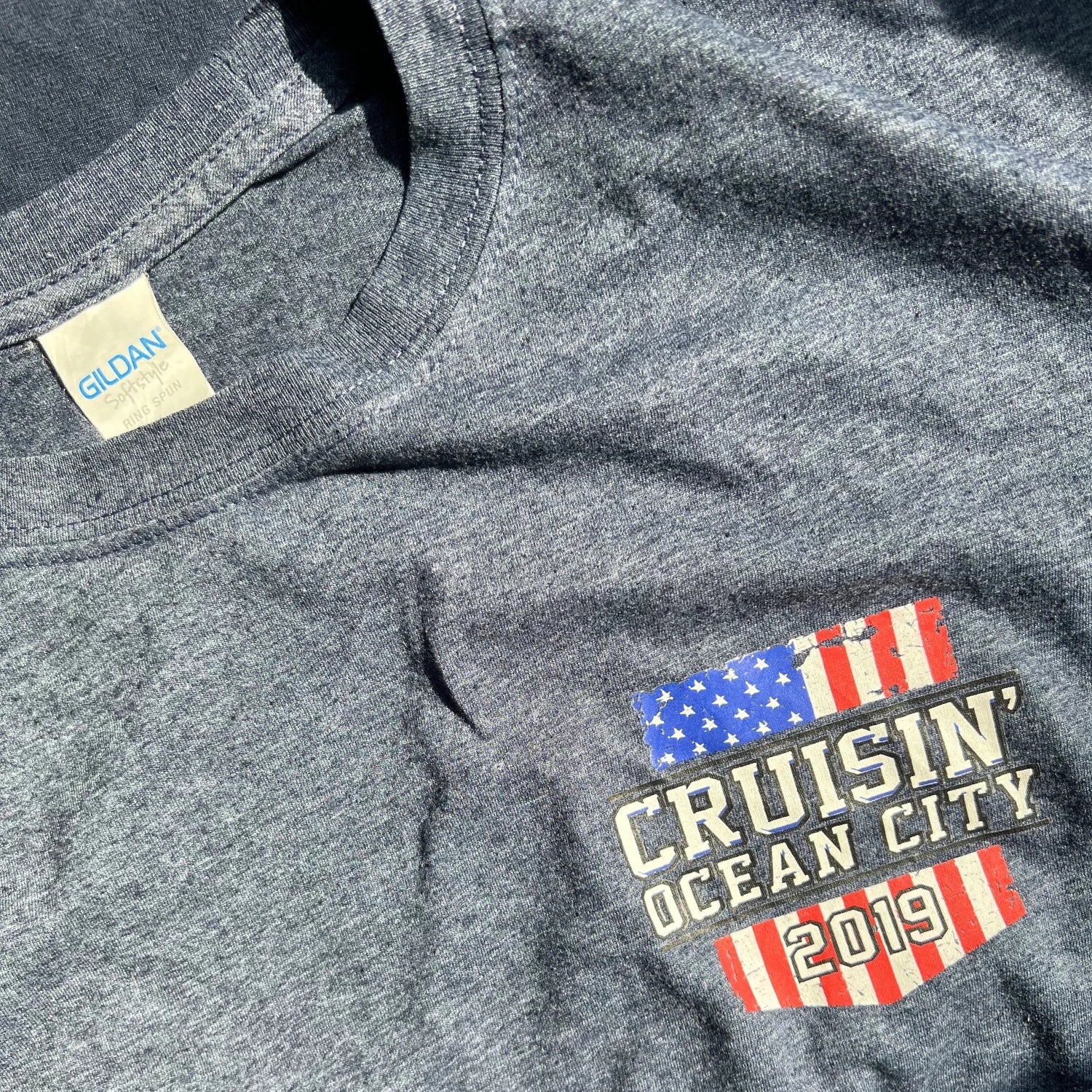 T-shirt with 'Cruisin' Ocean City 2019' design featuring American flags.