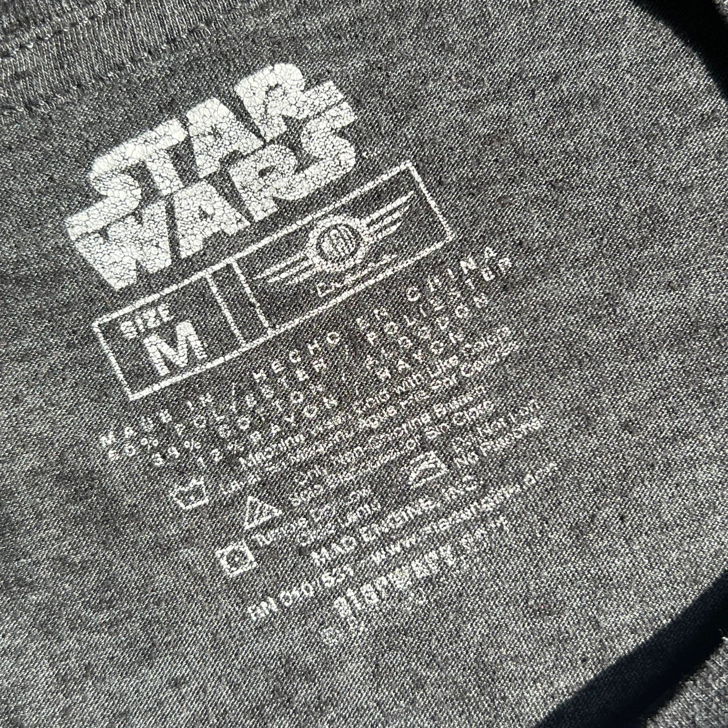 Grey t-shirt with Star Wars carelabel with garment information