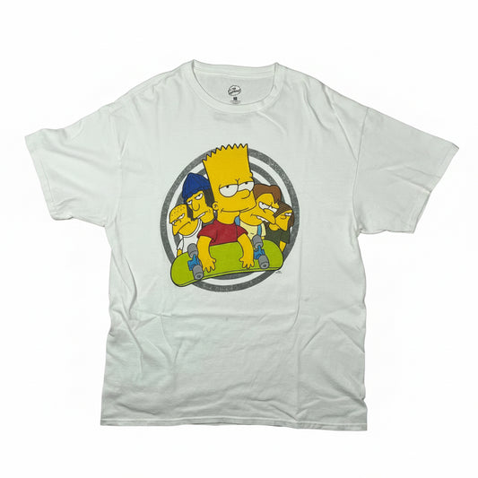 White t-shirt with a colorful graphic of cartoon characters